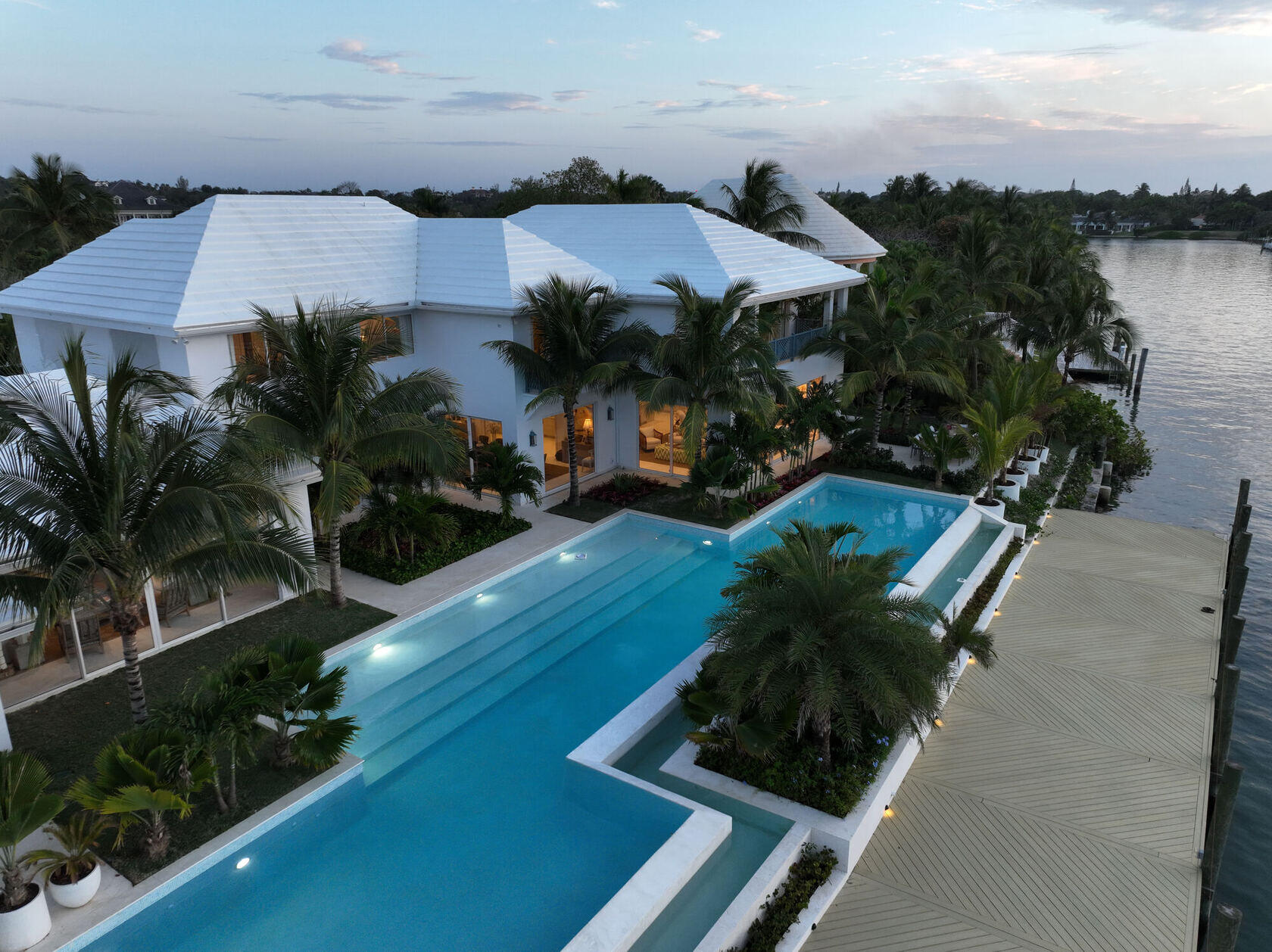 Aerial view of a Lyford Cay estate with pool on the waterway
